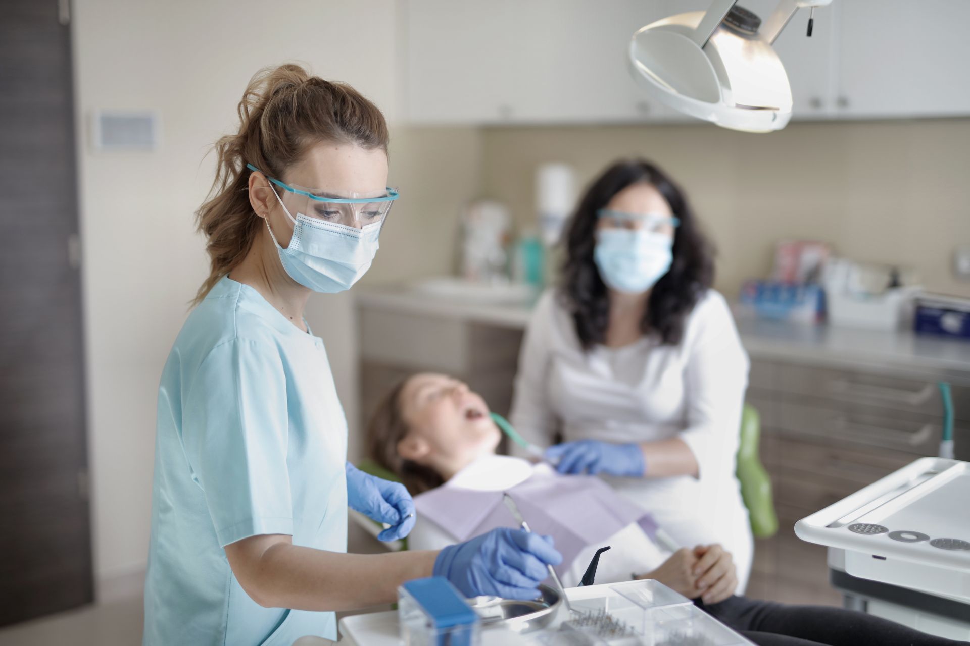 Patient paying at a dental practice front desk